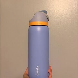 Owala light periwinkle and orange Insulated Water Bottle
